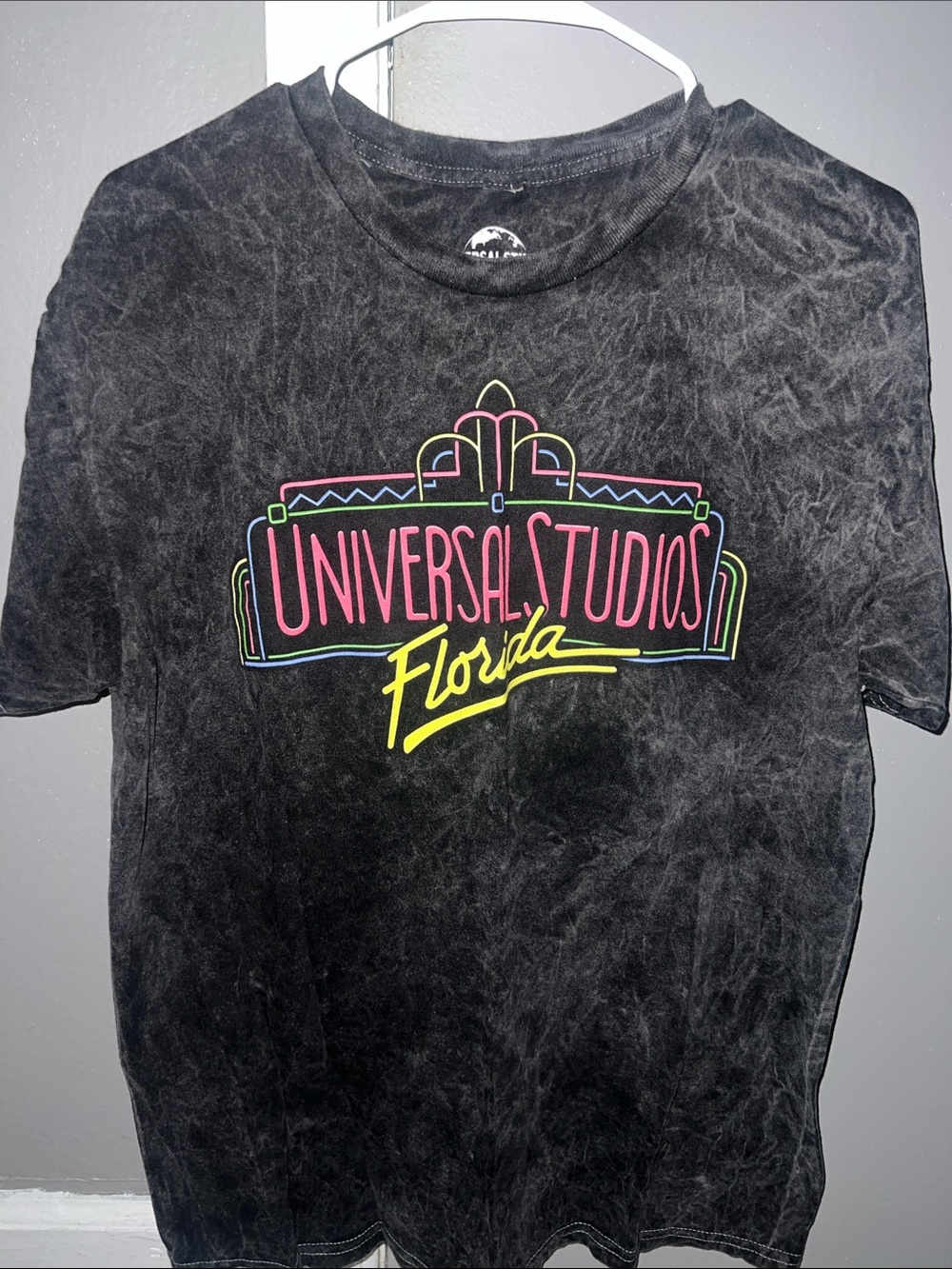 Universal Neon Graphic Tee - Black with Pink, Yellow, Blue & Green Accents